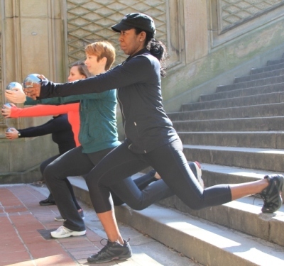Medicine Ball Lunge exercise on the stairs in Central Park, NYC